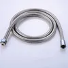 A coiled metal shower hose on a white background. Produktbild-Vorschau