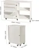 A white sewing table with dimensions shown in inches and millimeters. Voir les images du produit
