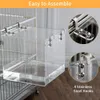 A close-up of a clear acrylic bird bathtub attached to a bird cage, with inset images showing the attachment mechanism and hooks. Produktbild-Vorschau