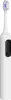 A white electric toothbrush with a black accent and a purple indicator on the brush head. Náhled obrázku produktu