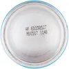 Close-up view of the bottom of a can with printed text. Produktbild-Vorschau
