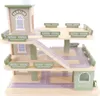 A wooden toy parking garage with multiple levels and ramps. Produktbild-Vorschau