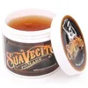 A jar of Suavecito pomade with the lid open, showing the product inside. Podgląd zdjęcia produktu