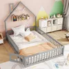 A child's bedroom with a house-shaped bed, shelves, and storage units. Anteprima dell’immagine prodotto