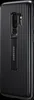 A black Samsung phone case with a ribbed texture and a built-in kickstand is shown against a black background. Produktbild-Vorschau
