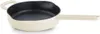 A cream-colored enameled cast iron frying pan with a black interior and a long handle is shown against a white background. Produktbild-Vorschau