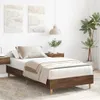 A bedroom scene with a bed, nightstands, and artwork. Produktbild-Vorschau