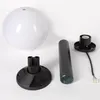 Disassembled components of a garden lamp are laid out on a white background. Voir les images du produit