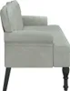 Side view of a light gray sofa with tufted backrest and rolled arms, resting on dark legs. Náhled obrázku produktu