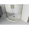 A corner shower cabin with a white tray and gold-colored frame, set in a modern bathroom with light gray tiled walls and floor. Podgląd zdjęcia produktu