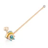 A wooden dinosaur push toy with a long handle, shown on a white background. Anteprima dell’immagine prodotto