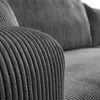 A close-up view of the textured fabric of a sofa. Produktbild-Vorschau