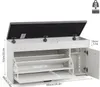A white shoe cabinet with a gray upholstered seat is shown with various dimensions indicated by text and lines. Voir les images du produit