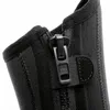A close-up shot of a black zipper on a neoprene boot. Produktbild-Vorschau
