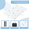 A flat lay image showing a folded futon mattress with a unicorn and rainbow pattern, along with three smaller images of accessories: two black straps, a black tote bag, and a close-up of the mattress pattern. Náhled obrázku produktu