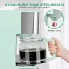 A close-up of a coffee maker with a hand holding the carafe, showing the drip-stop feature. Produktbild-Vorschau