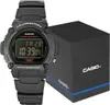 A black Casio digital watch and its packaging are displayed on a white background. Produktbild-Vorschau