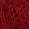 A close-up view of red yarn. Anteprima dell’immagine prodotto