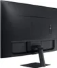 The back of a black Samsung monitor on a black stand, shown from a diagonal angle. Produktbild-Vorschau