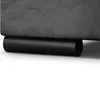 Close-up of the bottom of a dark gray upholstered bed frame with a black cylindrical leg. Produktbild-Vorschau