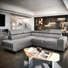 A modern living room with a large sectional sofa, a spiral staircase, and a fireplace. Produktbild-Vorschau
