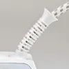 A close-up view of the power cord and its protective spring on a white appliance. Anteprima dell’immagine prodotto