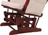Close-up view of the base and rocking mechanism of a wooden chair with cream-colored cushions. Voir les images du produit