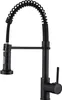 A black kitchen faucet with a coiled hose and a pull-down sprayer is shown against a white background. Produktbild-Vorschau