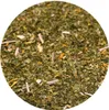 A close-up, circular crop of dried mate tea leaves and stems. Produktbild-Vorschau
