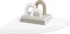 A decorative shelf with bookends on a white corner shelf. Voir les images du produit