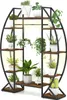 A multi-tiered plant stand filled with various potted plants, displayed against a plain background. Náhľad obrázku produktu