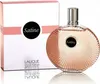 A perfume bottle and its box are displayed against a white background. Voir les images du produit