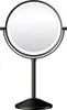 A black, double-sided makeup mirror with LED lighting on a stand, shown against a white background. Produktbild-Vorschau