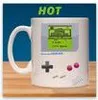 A mug designed to look like a Nintendo Game Boy, with a screen displaying a Super Mario Land game. Produktbild-Vorschau