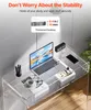 A clear acrylic desk with a laptop, coffee cup, books, and a digital clock. Voir les images du produit