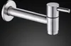 A close-up studio shot of a stainless steel wall-mounted faucet against a dark gradient background. Produktbild-Vorschau