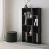 A black bookshelf with various decorative items and books, next to a green ottoman and a sheer curtain. Anteprima dell’immagine prodotto
