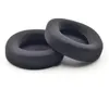 Two black ear pads for headphones are shown against a white background. Náhled obrázku produktu