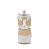 A back view of a white and tan Puma Karmen Rebelle Mid sneaker. Produktbild-Vorschau