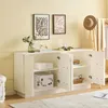 A white sideboard with four doors is shown in a room with yellow walls and framed artwork. Anteprima dell’immagine prodotto