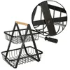 A two-tiered metal basket with a wooden handle, shown with a screwdriver being used to assemble it. Anteprima dell’immagine prodotto