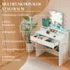 A white vanity table with LED lights, makeup, and decorative items, with text overlays describing storage features. Produktbild-Vorschau