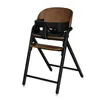 A high chair with a wooden back and seat, and black legs and tray. Voir les images du produit