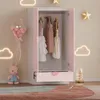 A child's wardrobe with clothes hanging inside, decorated with balloons, a bunny toy, and cloud-shaped lights. Anteprima dell’immagine prodotto