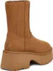 A side view of a brown UGG boot with a platform sole. Produktbild-Vorschau