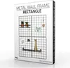 The image shows the packaging of a set of black metal wall frames. Produktbild-Vorschau