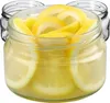 A close-up shot of a glass jar filled with lemon slices, with two other empty jars visible in the background. Produktbild-Vorschau