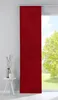A red panel curtain hanging in front of a window with a view of trees and sky. Produktbild-Vorschau