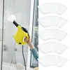 A hand holding a yellow steam cleaner and cleaning a glass shower door. Several white microfiber pads are arranged on the right side of the image. Náhled obrázku produktu