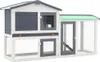 A multi-level wooden hutch for small animals, featuring a green roof and wire mesh enclosures. Náhled obrázku produktu